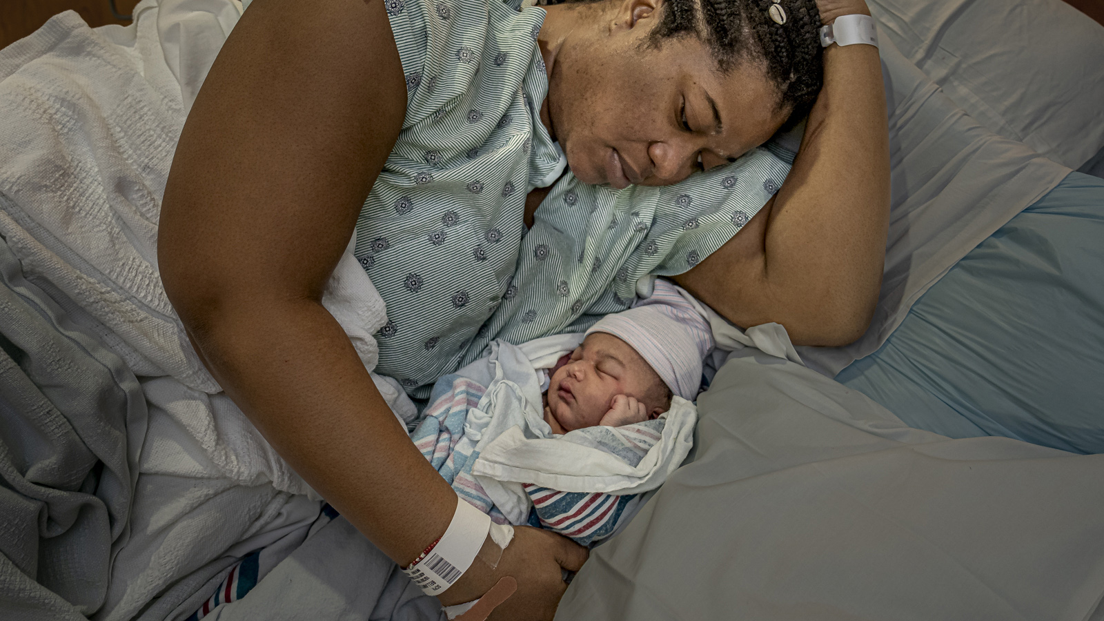 Erashea Bellany holds her daughter, Amenjah. Bellany, from Richmond, gave birth at her mother’s home in Hampton. After delivery, Erashea hemorrhaged and her midwife, Nicole Wardlaw, rushed her to the  Sentara CarePlex hospital in Hampton. Both mother and daughter are doing fine.