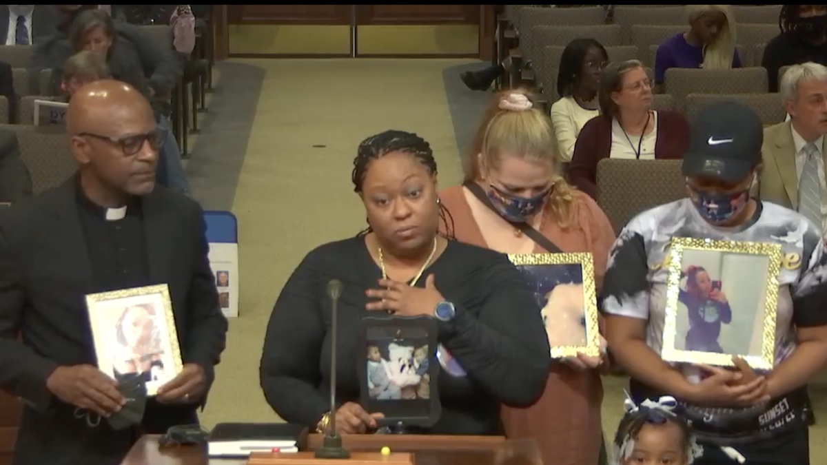 Photo from Virginia Beach Facebook. Elisheba Harris, mother of DeShayla Harris, speaks to city council. She is with members of her family and friend Gary McCollum.