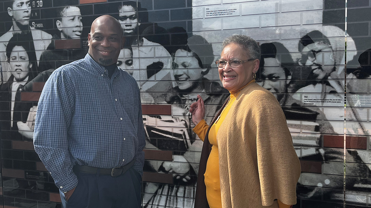 Lolita Portis, right, was one of the 17 Black students who integrated Norfolk’s white public schools in the 1950s. She and the other Norfolk 17 are immortalized on a new monument to the end of Massive Resistance in Norfolk. (Photo by Ryan Murphy) 