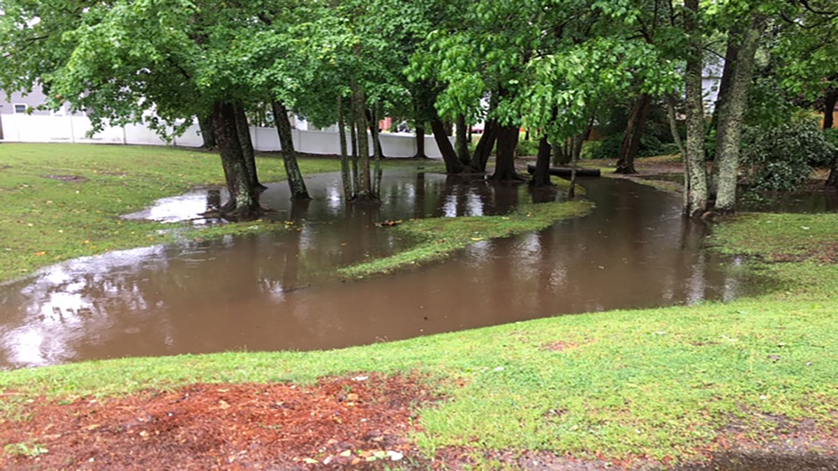 Photo courtesy of Carolyn White. Pughsville residents blame a lack of infrastructure and maintenance for regular flooding that traps residents and inundates houses.