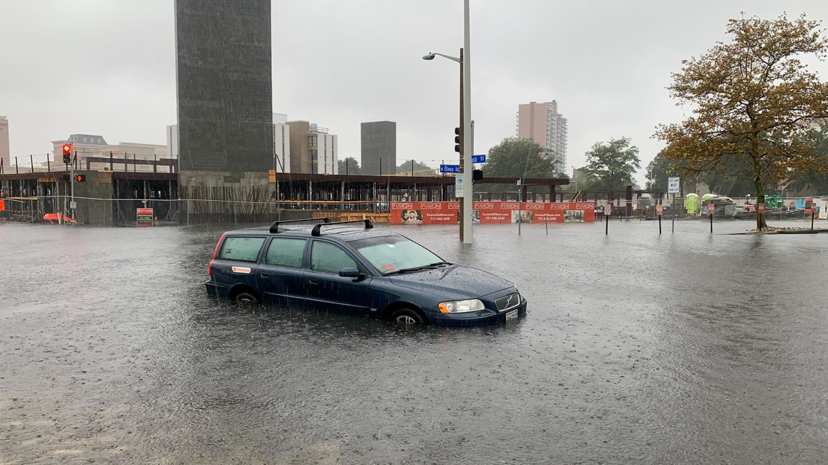 A car struggles with floodwaters in Norfolk in 2022. (Photo: Mechelle Hankerson)