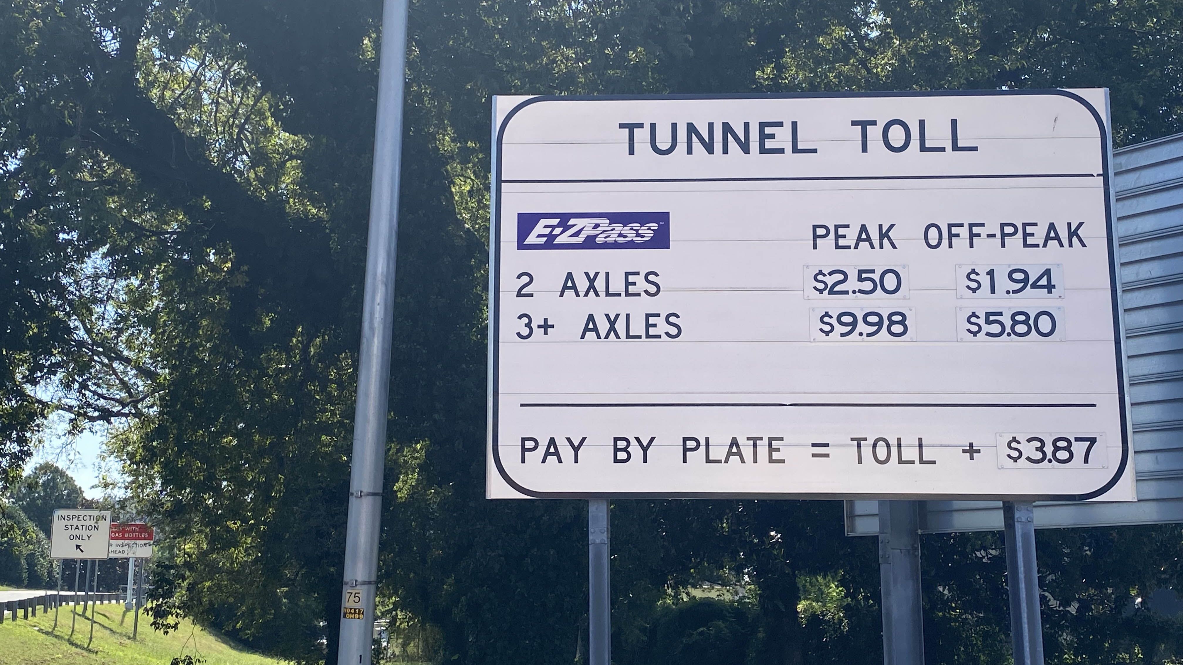 A sign displaying tolls on the Norfolk side of the Midtown Tunnel in September 2022.