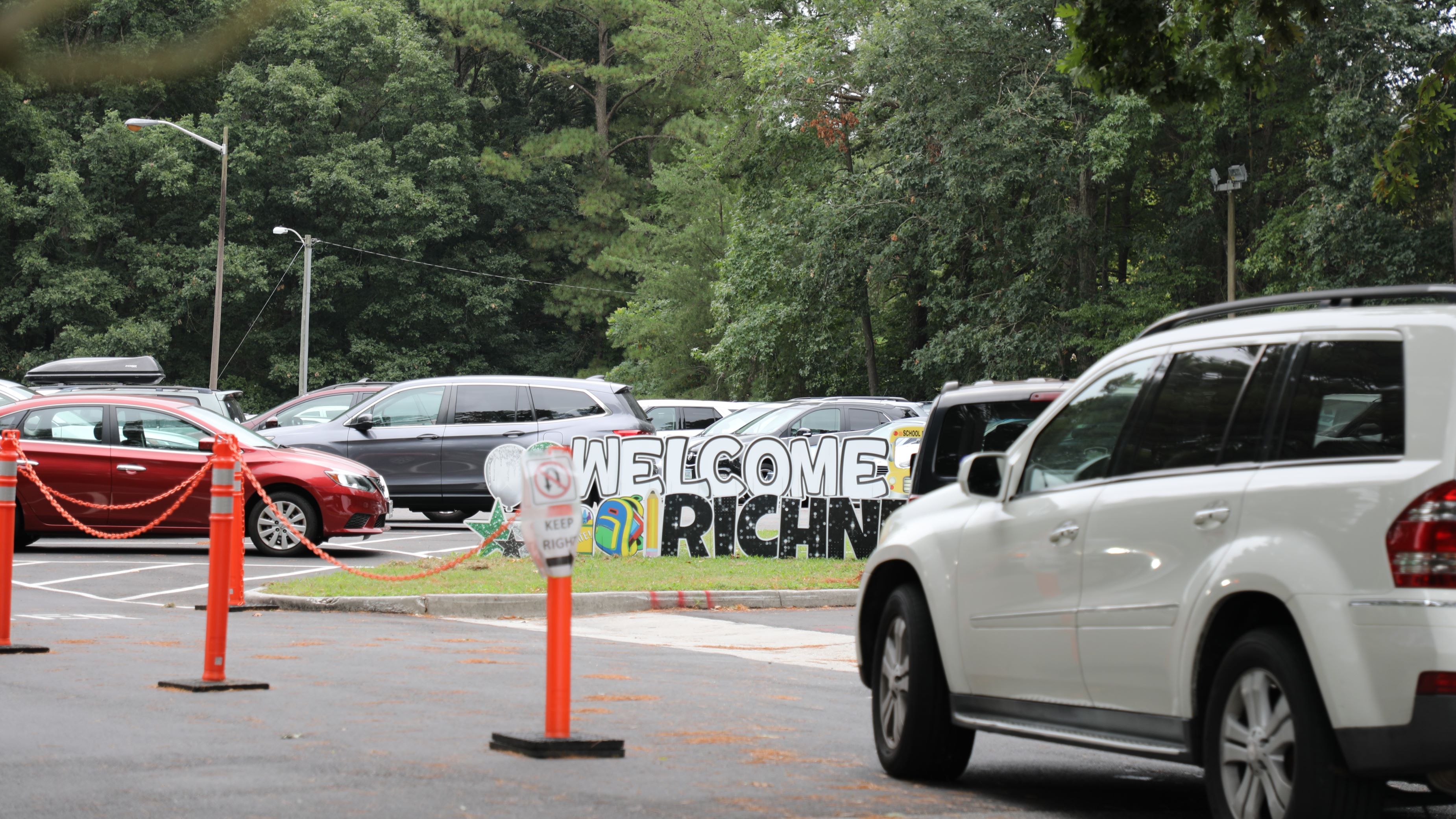 Cars wait in the drop off line at Richenck Elementary in Newport News, where a six-year-old shot his teacher in January. (Photo: Laura Philion)