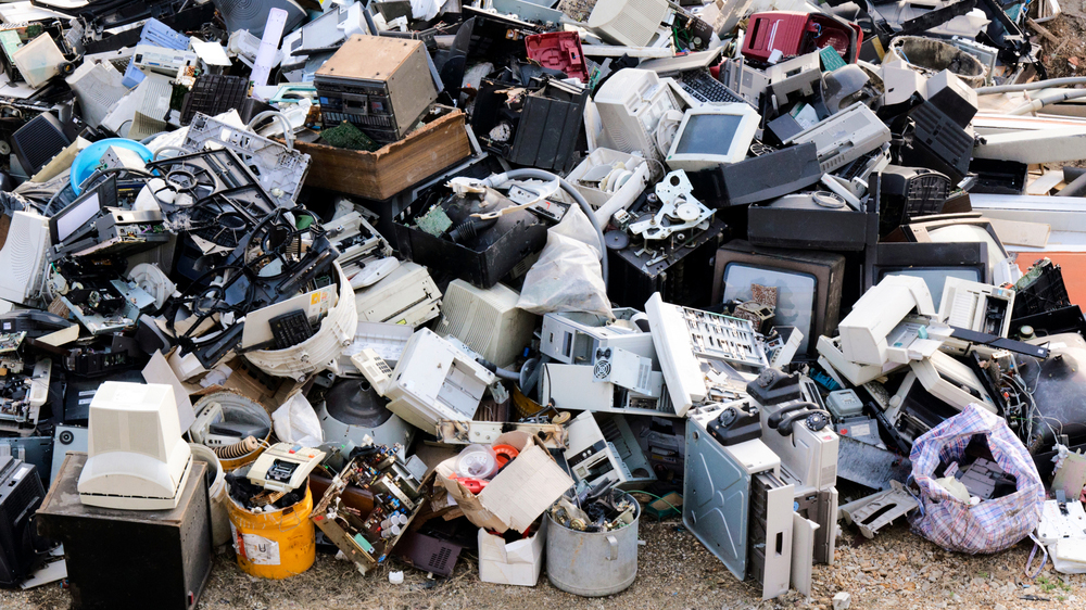 Photo via Shutterstock. A pile of electronic waste.